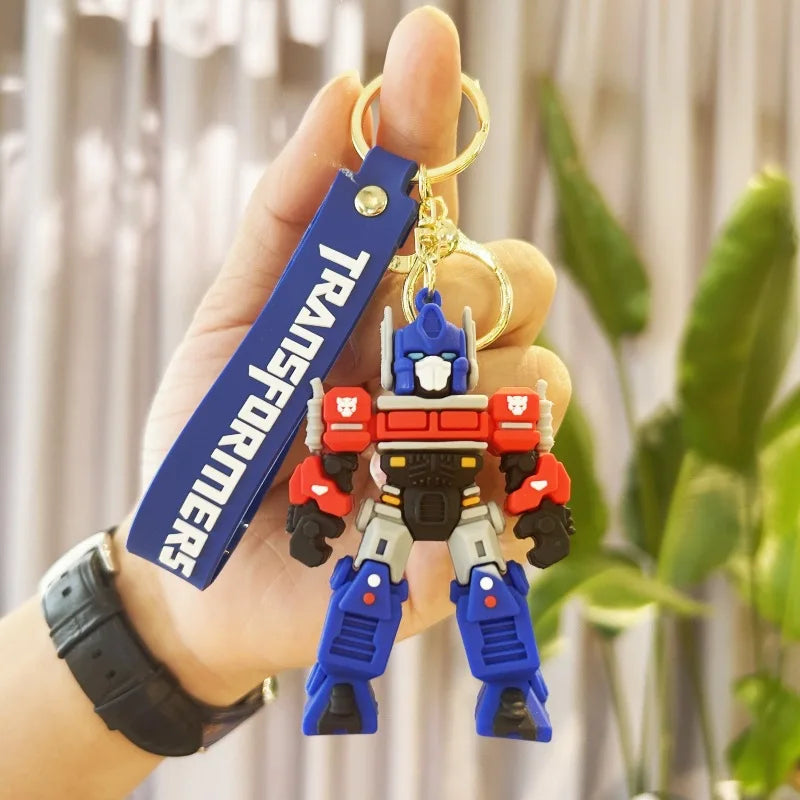 Cute Transformation Creative Peripheral Keychains 3D PVC Pendant Bumblebee Optimus Prime Bag Car Soft Rubber Figure Toy Keychain