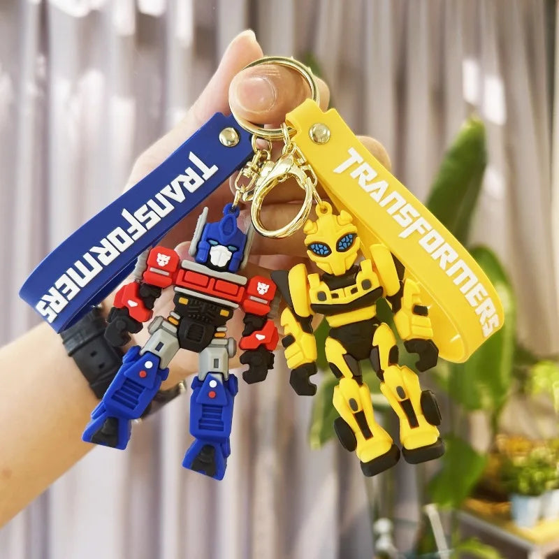 Cute Transformation Creative Peripheral Keychains 3D PVC Pendant Bumblebee Optimus Prime Bag Car Soft Rubber Figure Toy Keychain